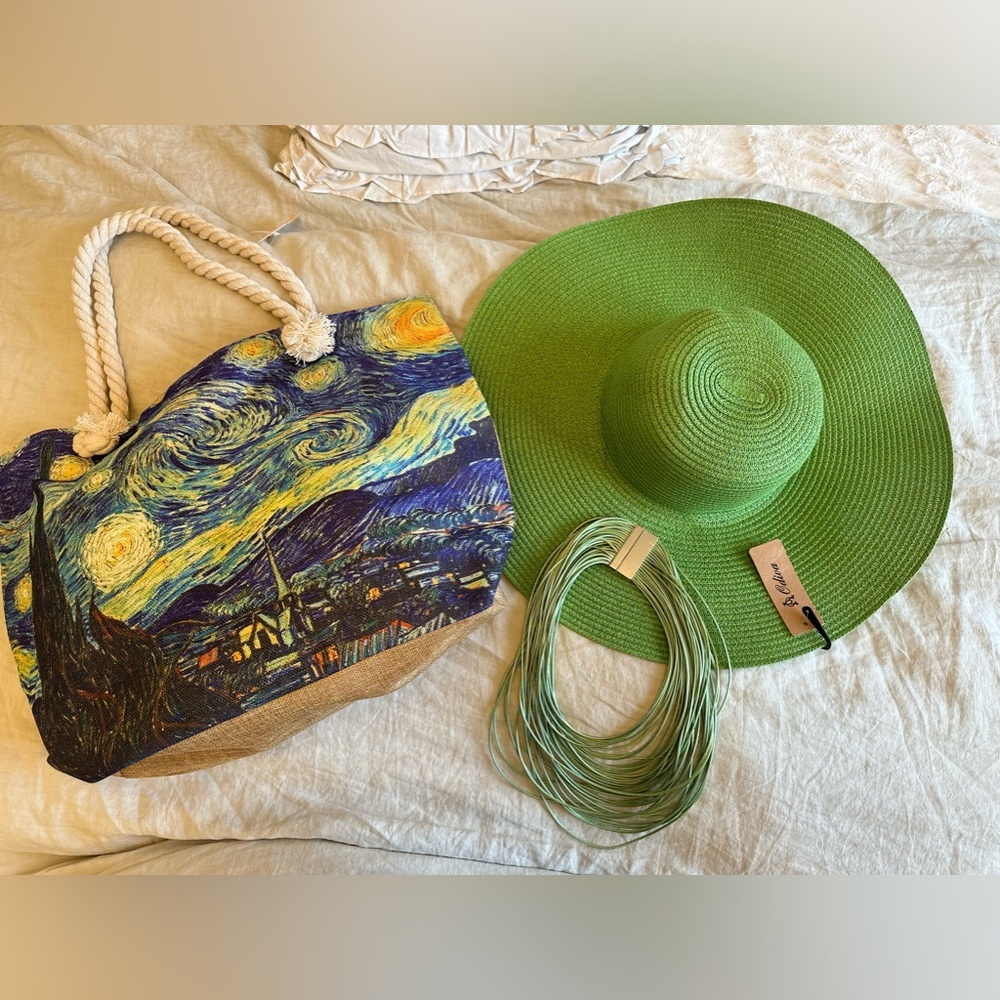 Beach bag, big floppy hat and matching necklace. Great swim bag.